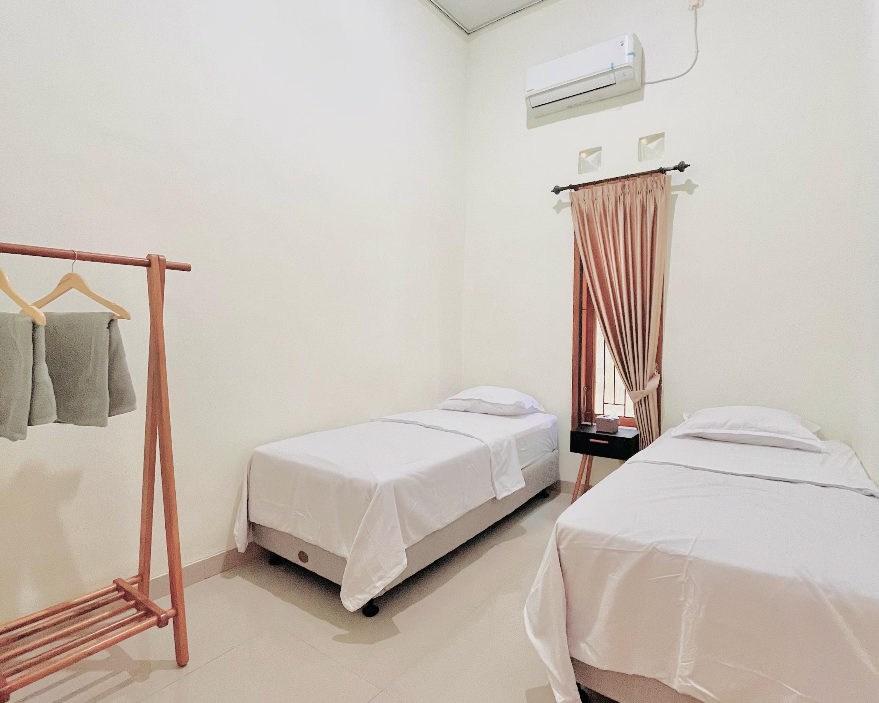 Kamar Twin Tinampi House